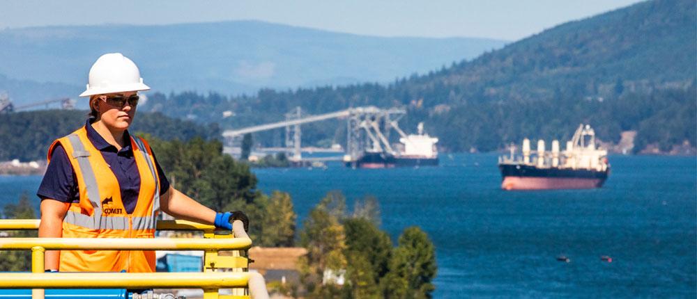 A TEMCO employee looks out over the ocean in Kalama, Washington.